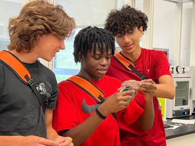 students use magnet on ferrofluid