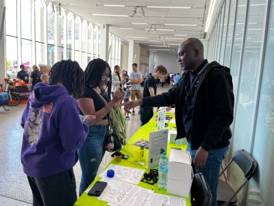 Festival attendees experiment with ferrofluids with Emanuel Irumhe