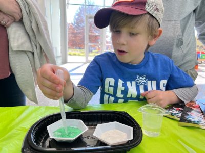 A child experiments with nano-sand