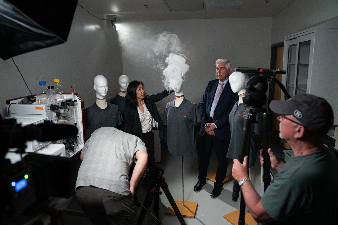 60 Minutes crew captures segment of mannequin demonstration with Linsey Marr and John LaPook 