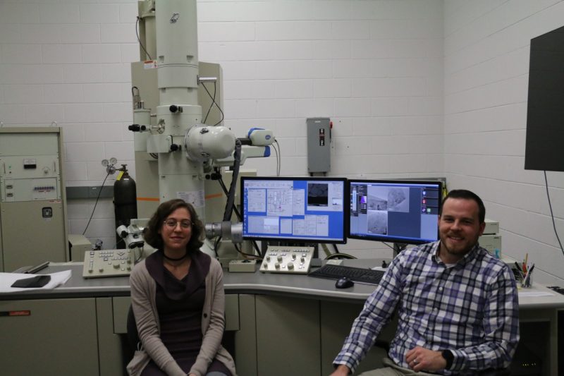 NanoEarth's Sheri Singerling with Cary Hill at the JEOL 2100 Transmission Electron Microscope (TEM)